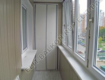 Остекление ПВХ лоджии с ригелями, утепление, отделка вагонкой, шкаф. г. Москва. Фото № 166.