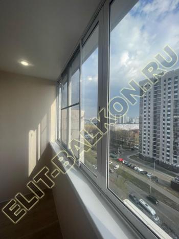 Утепление балкона, отделка стен и потолка панелями  ВИВИПАН, пол черновой, ламинат, откосы на окна, розетка. Москва, ул. Илимская, д. 10. Фото № 350